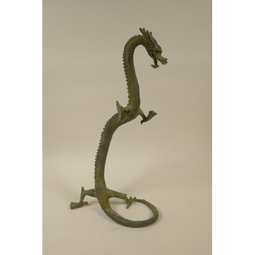 99 - A Chinese bronze figure of a rearing dragon with verdigris patina, 39cm high