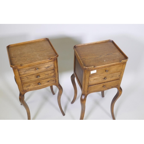 1011 - Pair of stained beech French style bedside chests, with galleried tops and three drawers, raised on ... 