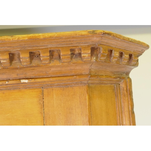 1019 - George III stripped pine corner display cabinet, the upper section with dentil cornice over a single... 