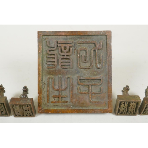 103 - A Chinese bronze kylin seal set with eight smaller kylin seals, 8x 9cm