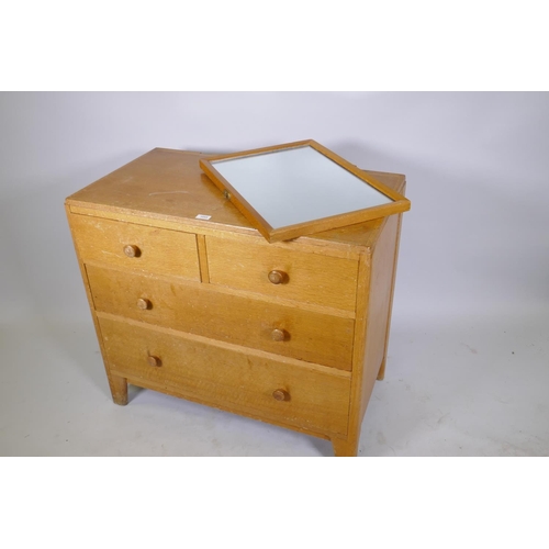 1055 - Mid century light oak Air Ministry dressing table/chest, two over two drawers, raised on shaped supp... 