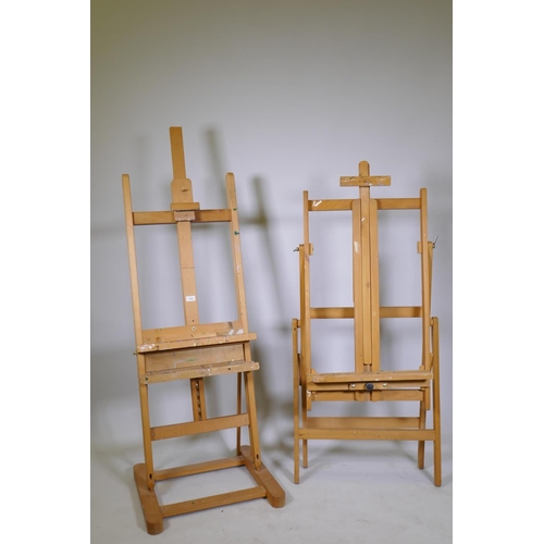 1056 - Artist's beech wood studio easel, 56 x 53 x 205cm high max, and a Winsor & Newton easel