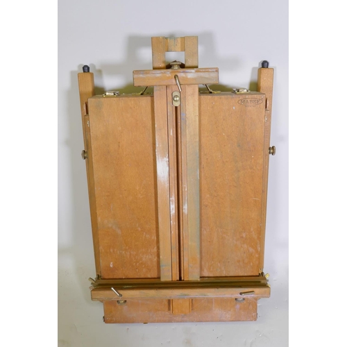 1059 - A Mabef Italian beechwood artist's field easel with paint box, 56 x 40 x 16cm, and another smaller