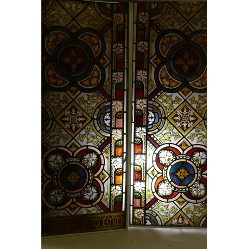 1070 - Architectural Salvage: a near pair of Victorian stained glass panels, one inscribed 'in remembrance ...