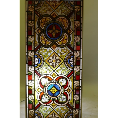 1070 - Architectural Salvage: a near pair of Victorian stained glass panels, one inscribed 'in remembrance ... 