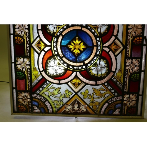 1070 - Architectural Salvage: a near pair of Victorian stained glass panels, one inscribed 'in remembrance ... 