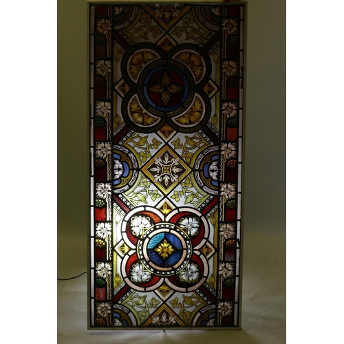 1070 - Architectural Salvage: a near pair of Victorian stained glass panels, one inscribed 'in remembrance ... 