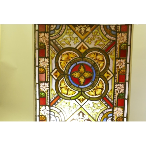 1070 - Architectural Salvage: a near pair of Victorian stained glass panels, one inscribed 'in remembrance ... 