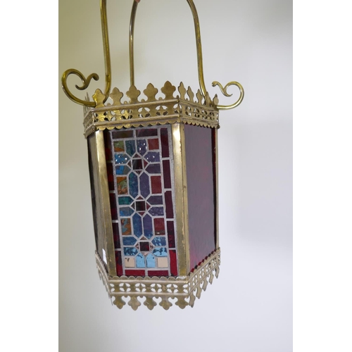 1072 - A brass hexagonal shaped hanging ceiling lantern with inset coloured and stained glass panels, 34 x ... 