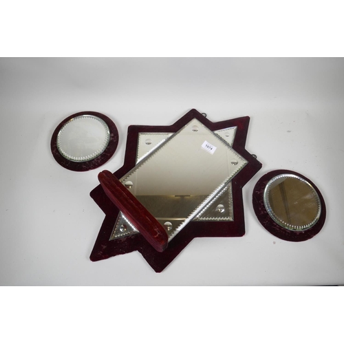 1074 - A Victorian cut glass sectional triptych wall mirror on a velvet covered mount, 60 x 44cm