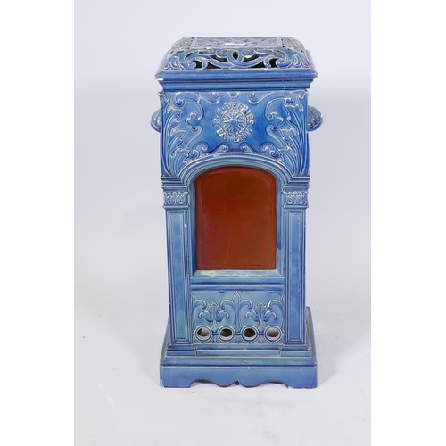 1088 - An antique glazed ceramic heater cover with pierced cover, inscribed D.C. Defries, patent, 32 x 25 x... 