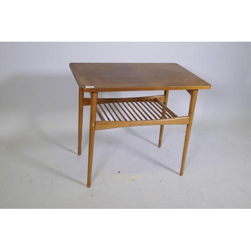 1100 - A mid century walnut side table with slatted under tier, 70 x 44 x 62cm