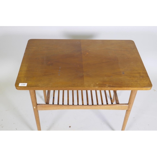 1100 - A mid century walnut side table with slatted under tier, 70 x 44 x 62cm