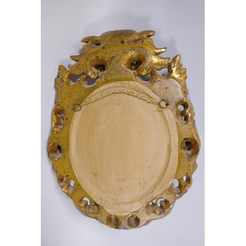 1188 - An Italian carved giltwood wall mirror, 67cm high