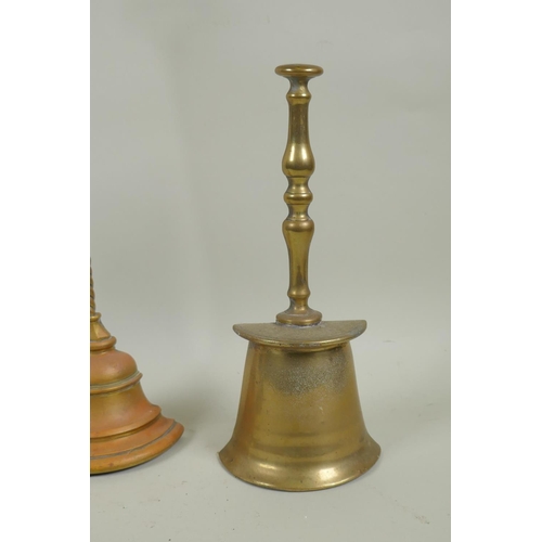 20 - Pair of Victorian brass doorstops, 18cm high and another in gilt brass