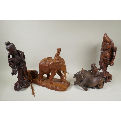 250 - Four oriental carved hardwood figures of fishermen, immortals and a figure riding animals, AF, losse... 