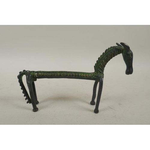 259 - An oriental bronze of stylised horse, 23cm