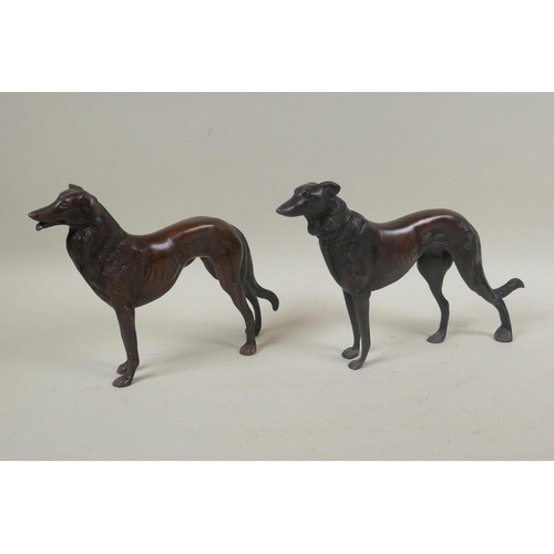 261 - A pair of bronze hounds, 27cm long