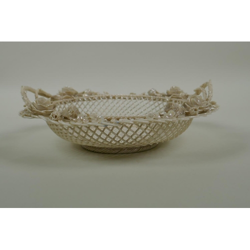 4 - A Belleek porcelain second period (1890-1920) basket with a three strand lattice base, thorny twig h... 