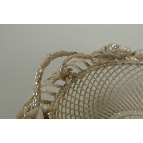 4 - A Belleek porcelain second period (1890-1920) basket with a three strand lattice base, thorny twig h... 