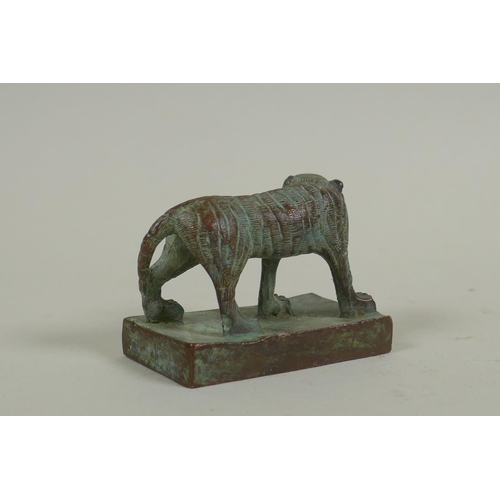 40 - Chinese copper seal in the form of a prowling tiger, 6cm long, 4.5cm high