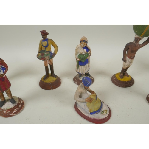 41 - A collection of twelve Indian painted plaster figures of tradespeople, AF, 17cm high