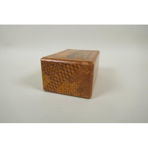 46 - A Japanese Yosegi-Zaiku marquetry puzzle box, opening to reveal a secret musical drawer, 15 x 10cm