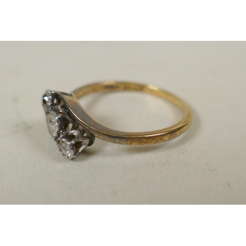 606 - 18ct gold and platinum trilogy ring set with three diamonds, approx 0.6ct, size N, 2.8g