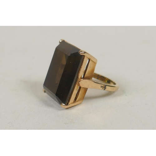 609 - 9ct gold ring set with a topaz, size L, 9.5g gross