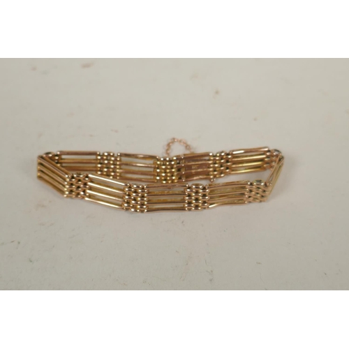 611 - 9ct gold gate link bracelet, 16.4g