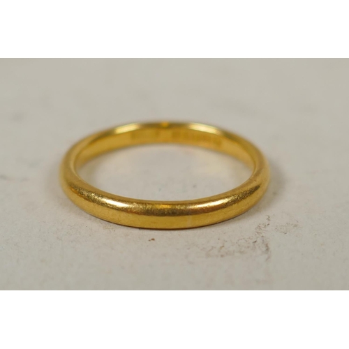 619 - Two 22ct gold wedding bands, size K and Q, 10.5g gross, and one 18ct gold wedding band, size Q, 3.4g