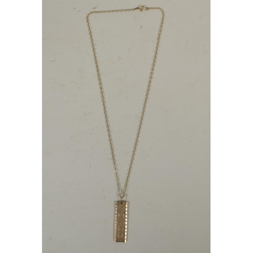 625 - 9ct gold ingot on chain, 17.8g