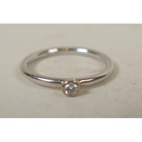 626 - Two platinum and diamond solitaire rings and another set with a marquise cut diamond, approx 0.5ct, ... 