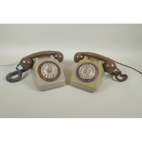 63 - A pair of vintage rotary dial telephones