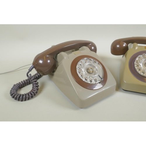 63 - A pair of vintage rotary dial telephones