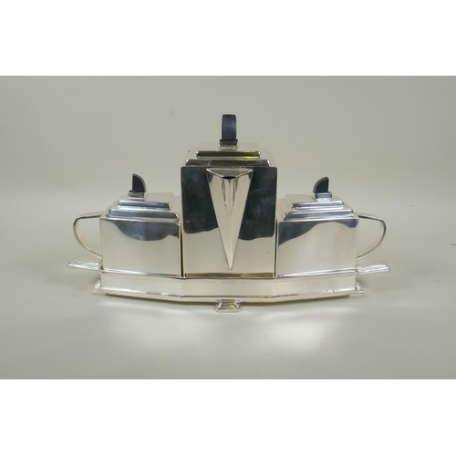 630 - An Art Deco style silver plated tea set, 40cm long