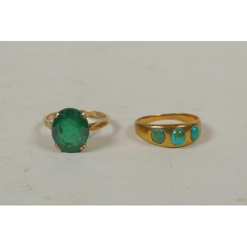 633 - 18ct gold ring set with three turquoise stones, size M, 3.8g, and a 9ct gold dress ring set with a g... 