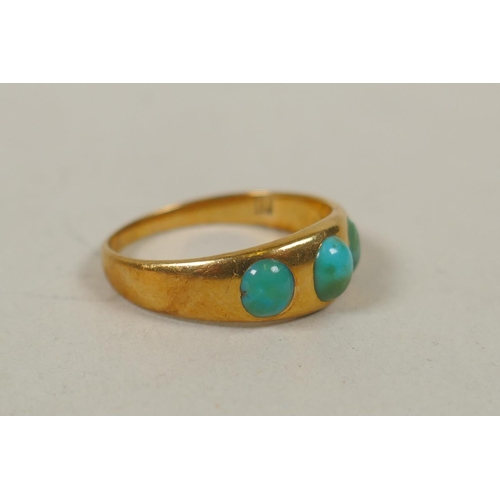 633 - 18ct gold ring set with three turquoise stones, size M, 3.8g, and a 9ct gold dress ring set with a g... 