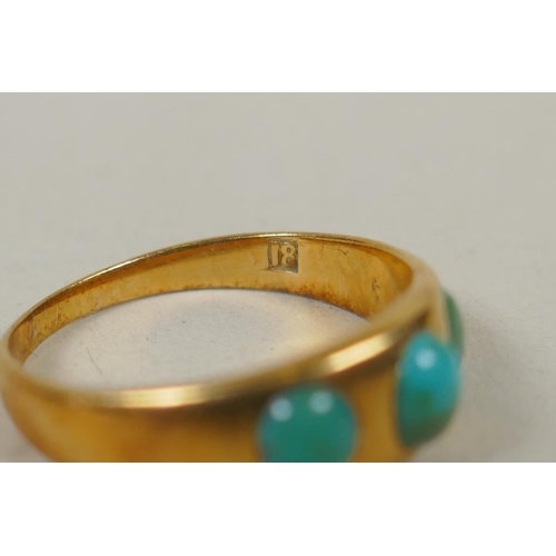 633 - 18ct gold ring set with three turquoise stones, size M, 3.8g, and a 9ct gold dress ring set with a g... 