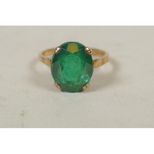 633 - 18ct gold ring set with three turquoise stones, size M, 3.8g, and a 9ct gold dress ring set with a g... 