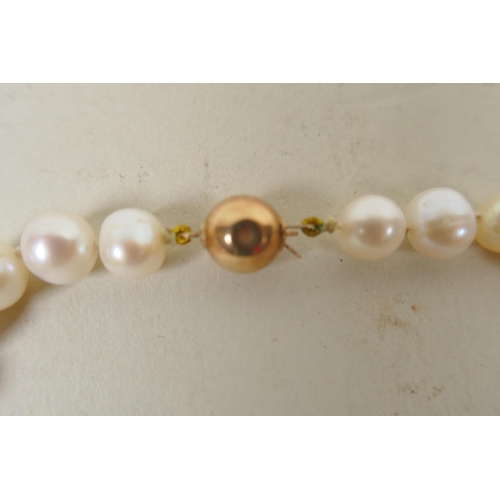 634 - Pearl necklace with 9ct clasp, and another with 925 silver clasp, largest 52cm