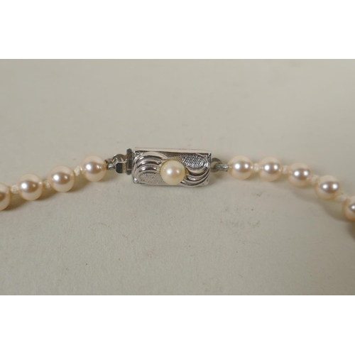 634 - Pearl necklace with 9ct clasp, and another with 925 silver clasp, largest 52cm