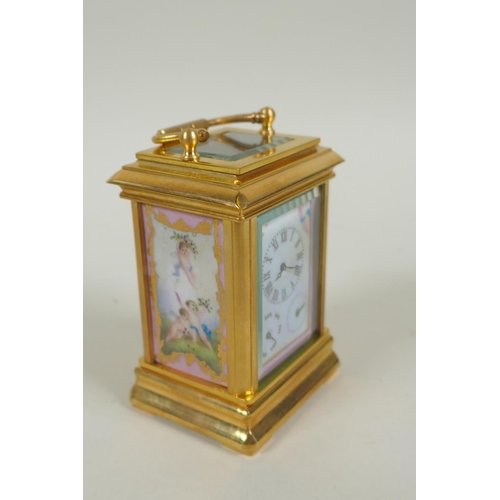 635 - A miniature gilt brass carriage clock with Sevres style paste panels, the dial with day and date sub... 