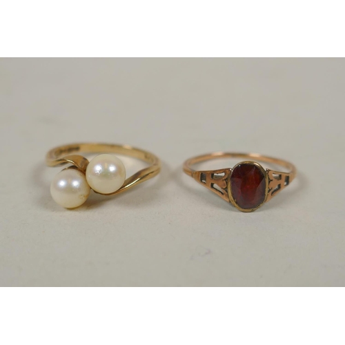 640 - 9ct gold ring set with two pearls, size N, 2.8g, and a 9ct gold ring set with a garnet, size L/M, 1.... 