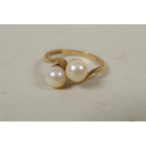 640 - 9ct gold ring set with two pearls, size N, 2.8g, and a 9ct gold ring set with a garnet, size L/M, 1.... 