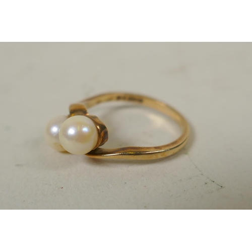 640 - 9ct gold ring set with two pearls, size N, 2.8g, and a 9ct gold ring set with a garnet, size L/M, 1.... 