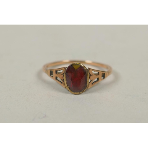 640 - 9ct gold ring set with two pearls, size N, 2.8g, and a 9ct gold ring set with a garnet, size L/M, 1.... 