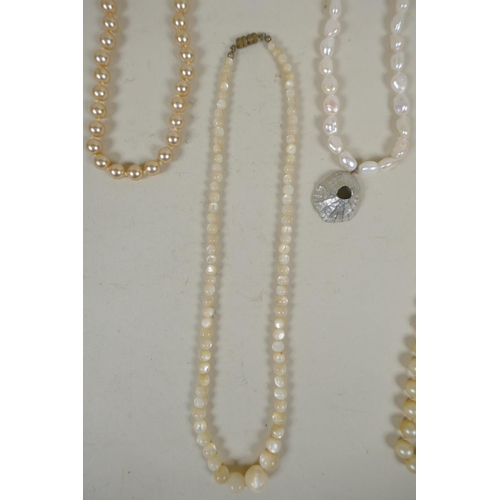 642 - Four faux pearl necklaces and three baroque pearl necklaces