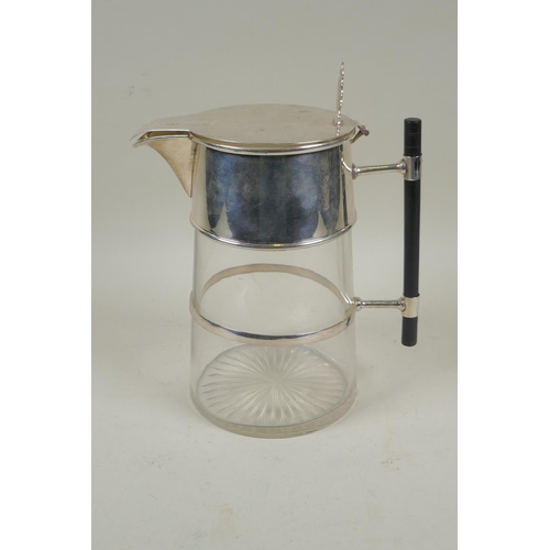 660 - A Christopher Dresser style silver plate and glass decanter, 24cm high