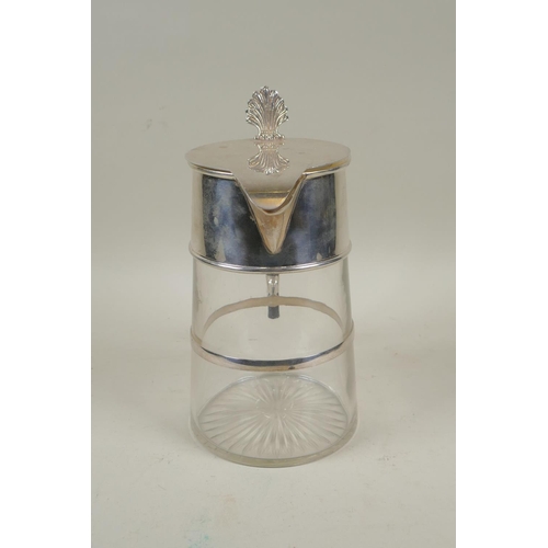 660 - A Christopher Dresser style silver plate and glass decanter, 24cm high